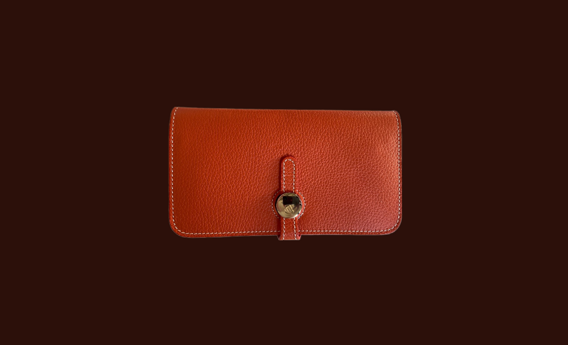 Calipso wallet in leather. Orange colour