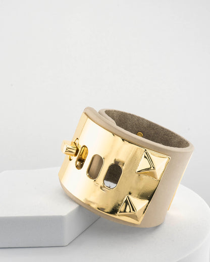 Leather bracelet with, bronze pyramids plated in 18K gold.
An original Marri Cortona design — handmade in Tuscany.