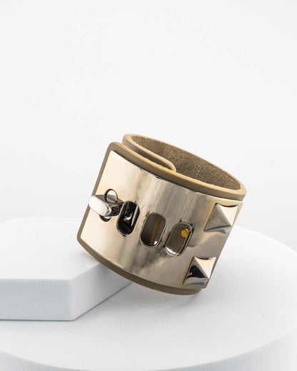 Leather bracelet with, bronze pyramids plated in 18K gold.
An original Marri Cortona design — handmade in Tuscany.