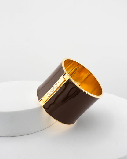 Handcrafted in Tuscany, the MarriCortona Scatto Bracelet in 18k gold bronze with hand-painted enamel blends timeless Italian craftsmanship and modern design.