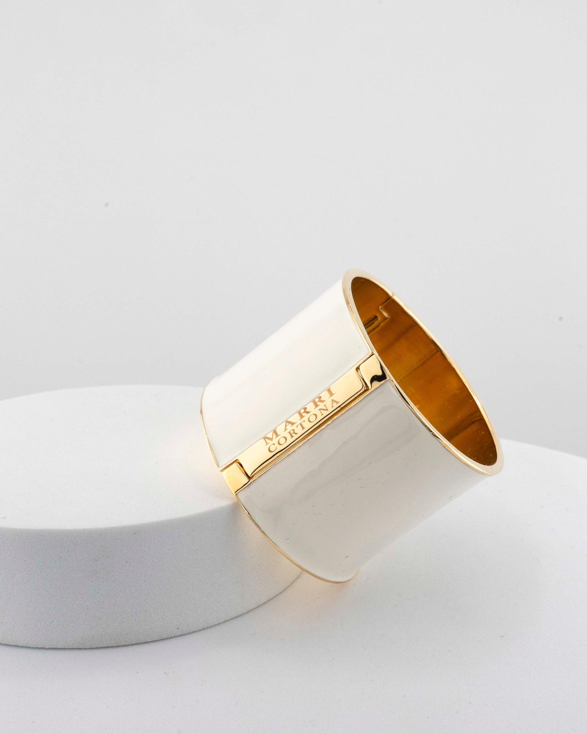 Handcrafted in Tuscany, the MarriCortona Scatto Bracelet in 18k gold bronze with hand-painted enamel blends timeless Italian craftsmanship and modern design.