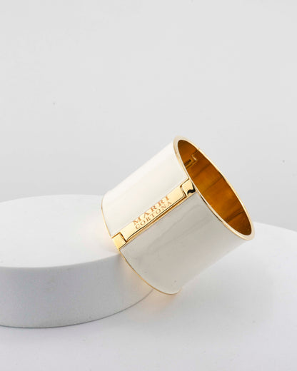 Handcrafted in Tuscany, the MarriCortona Scatto Bracelet in 18k gold bronze with hand-painted enamel blends timeless Italian craftsmanship and modern design.