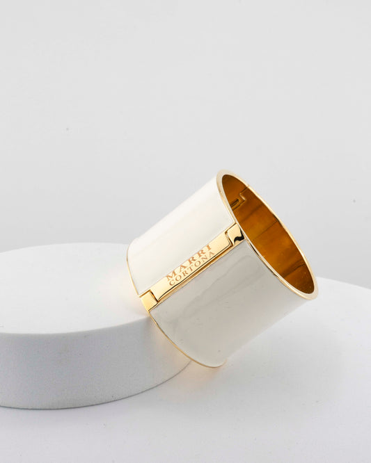 Handcrafted in Tuscany, the MarriCortona Scatto Bracelet in 18k gold bronze with hand-painted enamel blends timeless Italian craftsmanship and modern design.