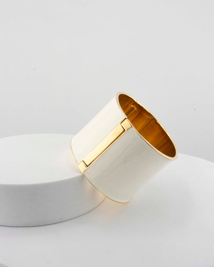 Handcrafted in Tuscany, the MarriCortona Scatto Bracelet in 18k gold bronze with hand-painted enamel blends timeless Italian craftsmanship and modern design.