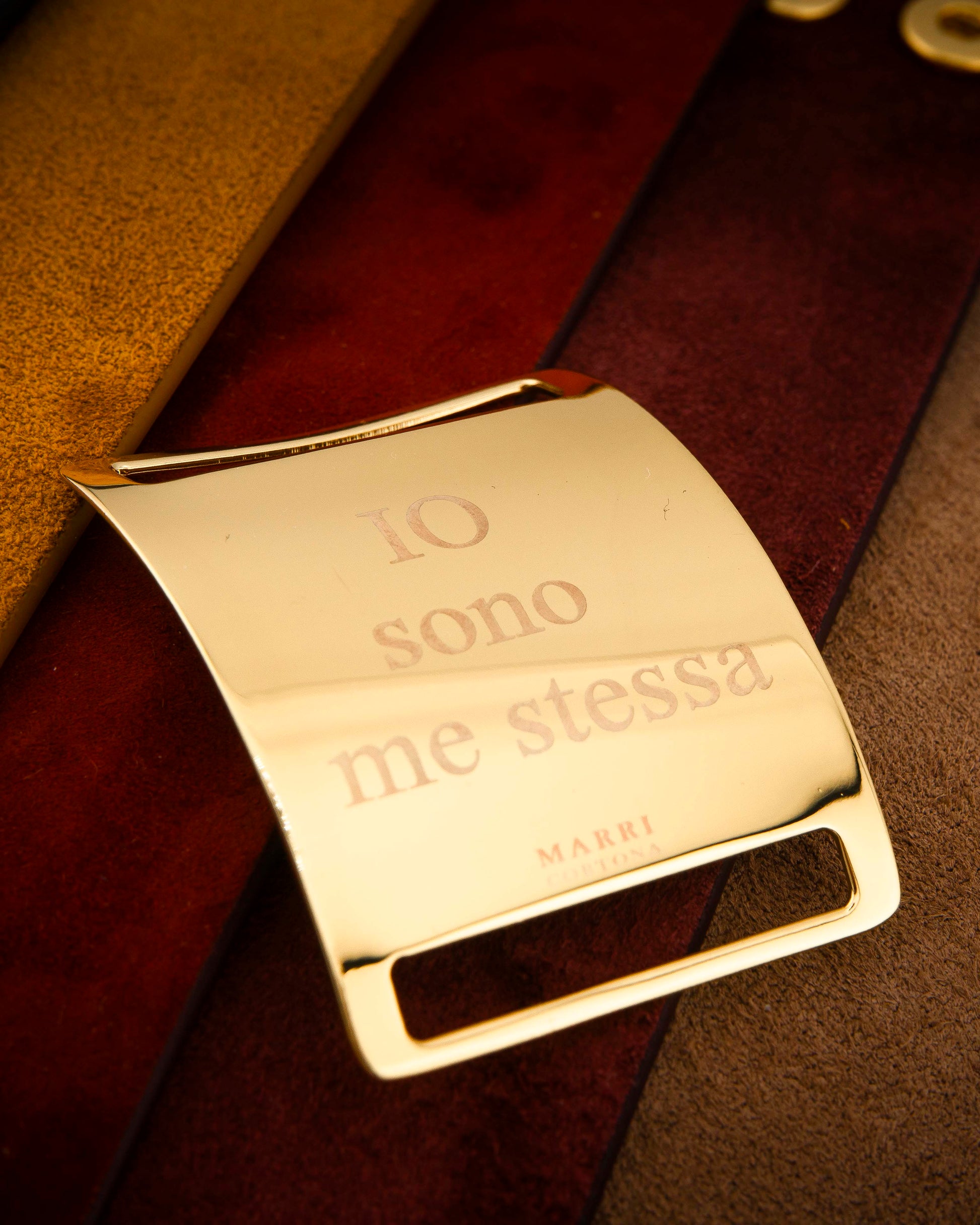 Personalized bracelet with 18K gold-plated bronze charm and suede leather strap.
An original Marri Cortona design — handmade in Tuscany.