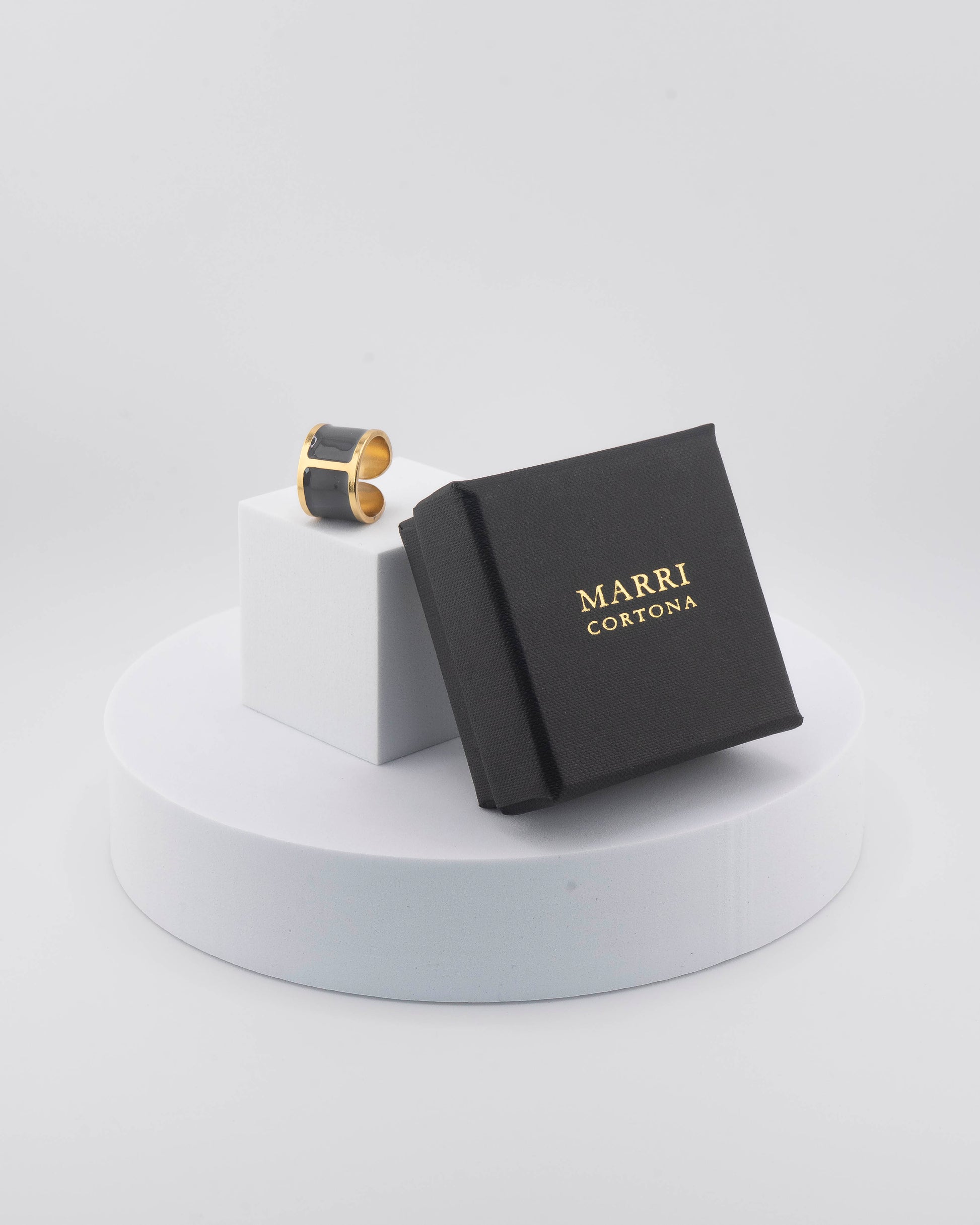 Handcrafted in Tuscany, the MarriCortona Smalto Rings combine 18k gold and hand-painted enamel — vibrant, refined, and authentically Made in Italy.