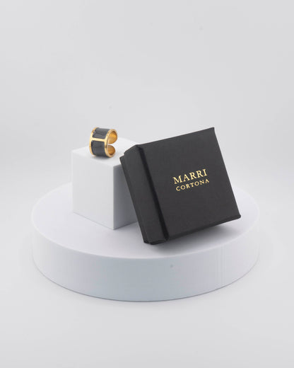 Handcrafted in Tuscany, the MarriCortona Smalto Rings combine 18k gold and hand-painted enamel — vibrant, refined, and authentically Made in Italy.