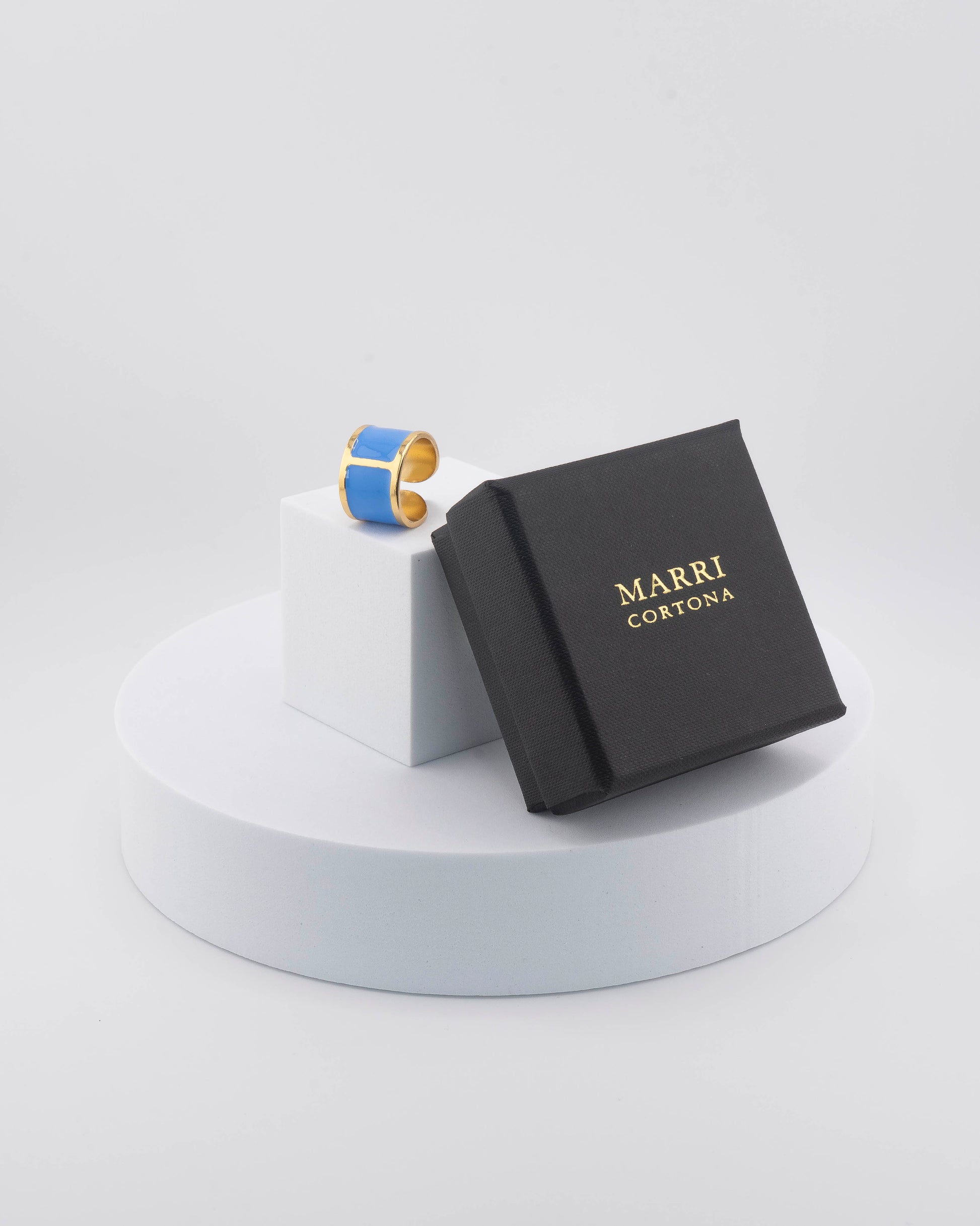 Handcrafted in Tuscany, the MarriCortona Smalto Rings combine 18k gold and hand-painted enamel — vibrant, refined, and authentically Made in Italy.