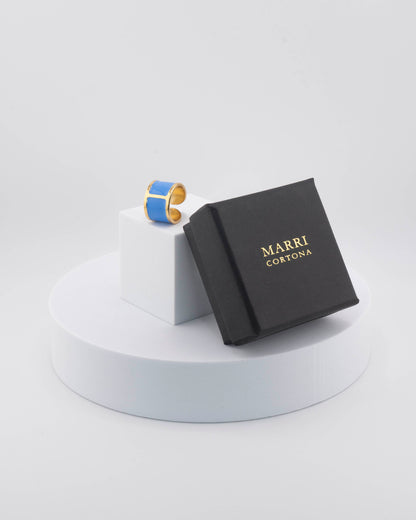 Handcrafted in Tuscany, the MarriCortona Smalto Rings combine 18k gold and hand-painted enamel — vibrant, refined, and authentically Made in Italy.