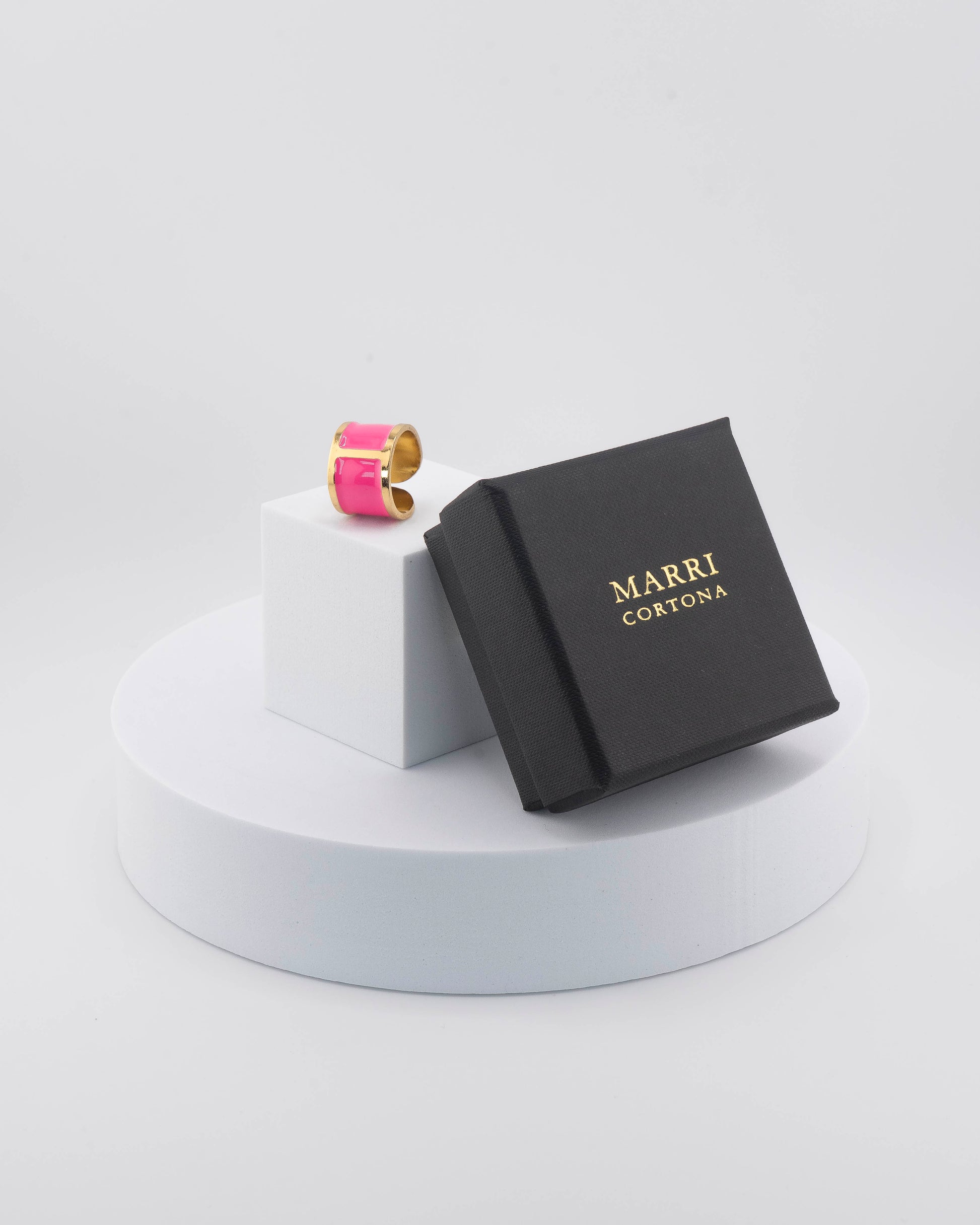 Handcrafted in Tuscany, the MarriCortona Smalto Rings combine 18k gold and hand-painted enamel — vibrant, refined, and authentically Made in Italy.