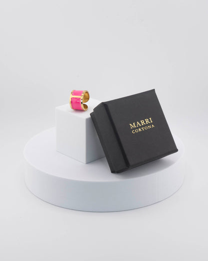 Handcrafted in Tuscany, the MarriCortona Smalto Rings combine 18k gold and hand-painted enamel — vibrant, refined, and authentically Made in Italy.