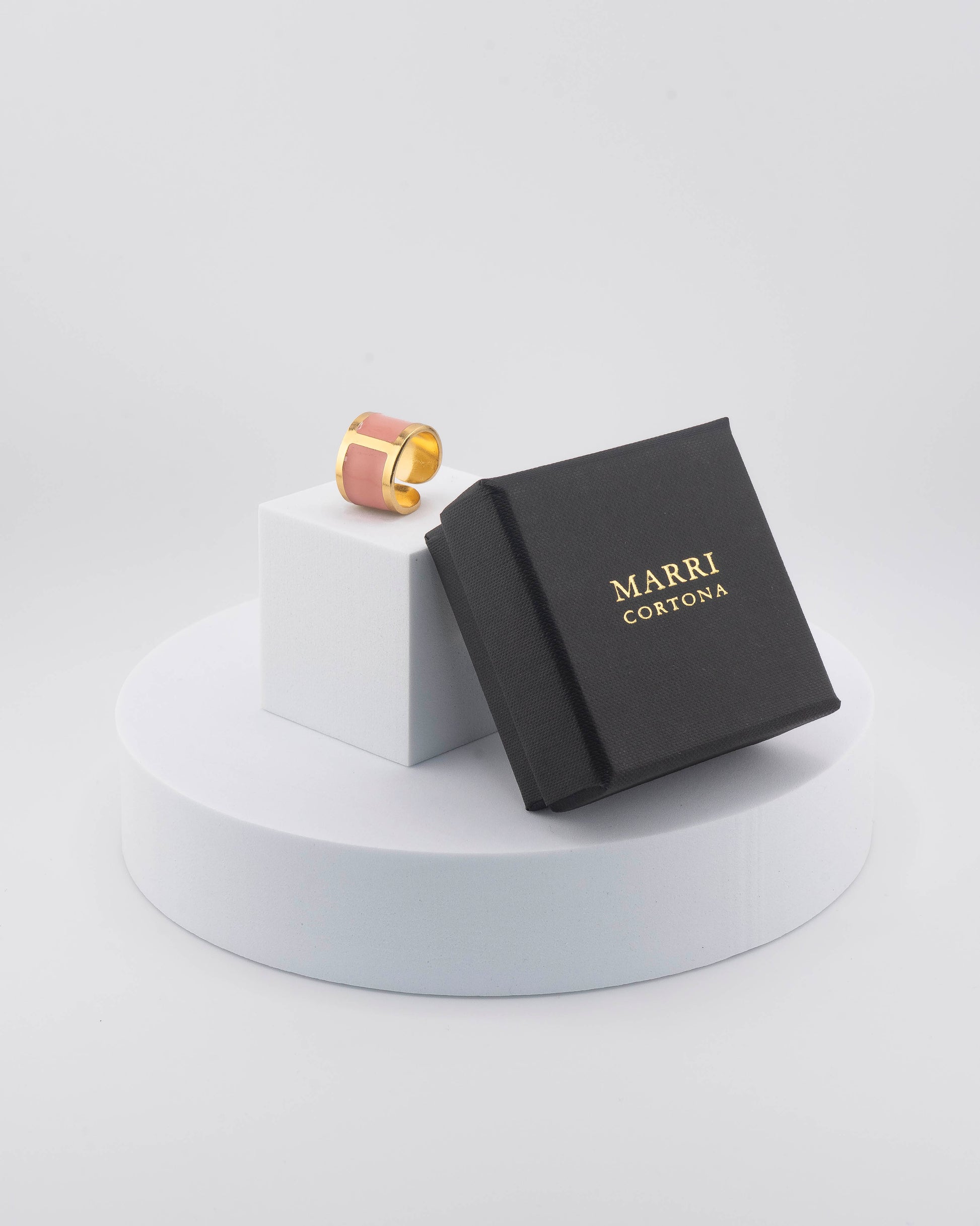 Handcrafted in Tuscany, the MarriCortona Smalto Rings combine 18k gold and hand-painted enamel — vibrant, refined, and authentically Made in Italy.