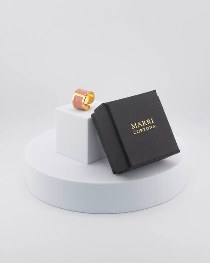 Handcrafted in Tuscany, the MarriCortona Smalto Rings combine 18k gold and hand-painted enamel — vibrant, refined, and authentically Made in Italy.