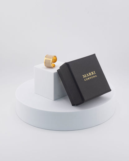 Handcrafted in Tuscany, the MarriCortona Smalto Rings combine 18k gold and hand-painted enamel — vibrant, refined, and authentically Made in Italy.