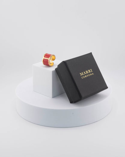 Handcrafted in Tuscany, the MarriCortona Smalto Rings combine 18k gold and hand-painted enamel — vibrant, refined, and authentically Made in Italy.