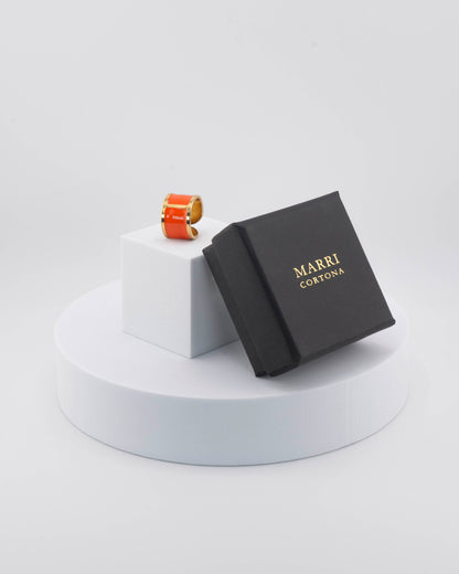 Handcrafted in Tuscany, the MarriCortona Smalto Rings combine 18k gold and hand-painted enamel — vibrant, refined, and authentically Made in Italy.