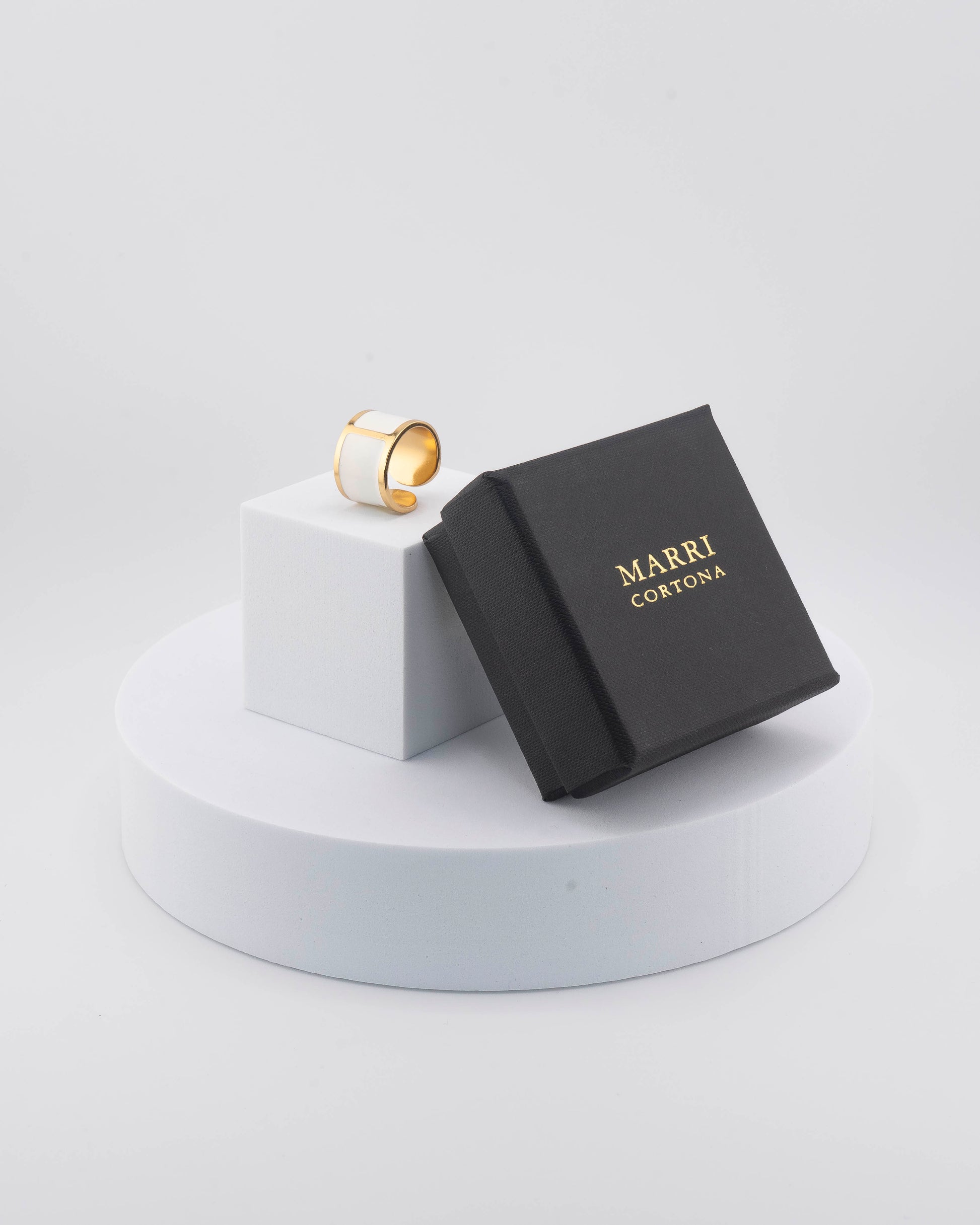 Handcrafted in Tuscany, the MarriCortona Smalto Rings combine 18k gold and hand-painted enamel — vibrant, refined, and authentically Made in Italy.