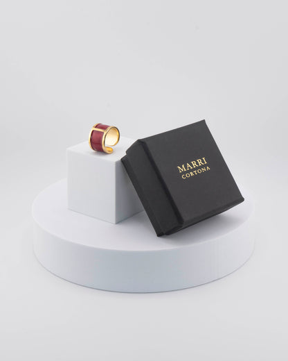 Handcrafted in Tuscany, the MarriCortona Smalto Rings combine 18k gold and hand-painted enamel — vibrant, refined, and authentically Made in Italy.