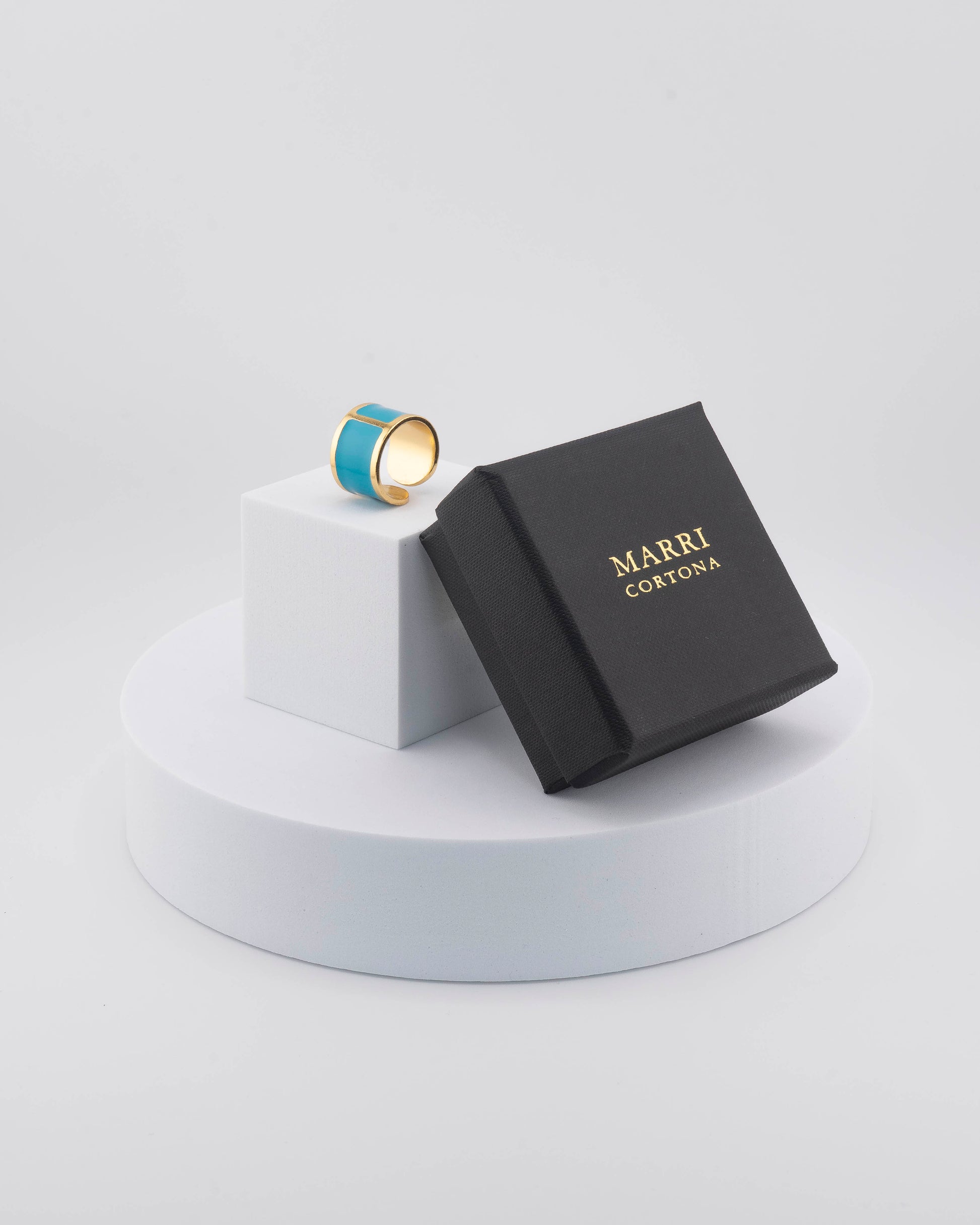 Handcrafted in Tuscany, the MarriCortona Smalto Rings combine 18k gold and hand-painted enamel — vibrant, refined, and authentically Made in Italy.