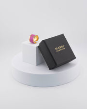Handcrafted in Tuscany, the MarriCortona Smalto Rings combine 18k gold and hand-painted enamel — vibrant, refined, and authentically Made in Italy.