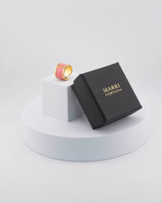 Handcrafted in Tuscany, the MarriCortona Smalto Rings combine 18k gold and hand-painted enamel — vibrant, refined, and authentically Made in Italy.