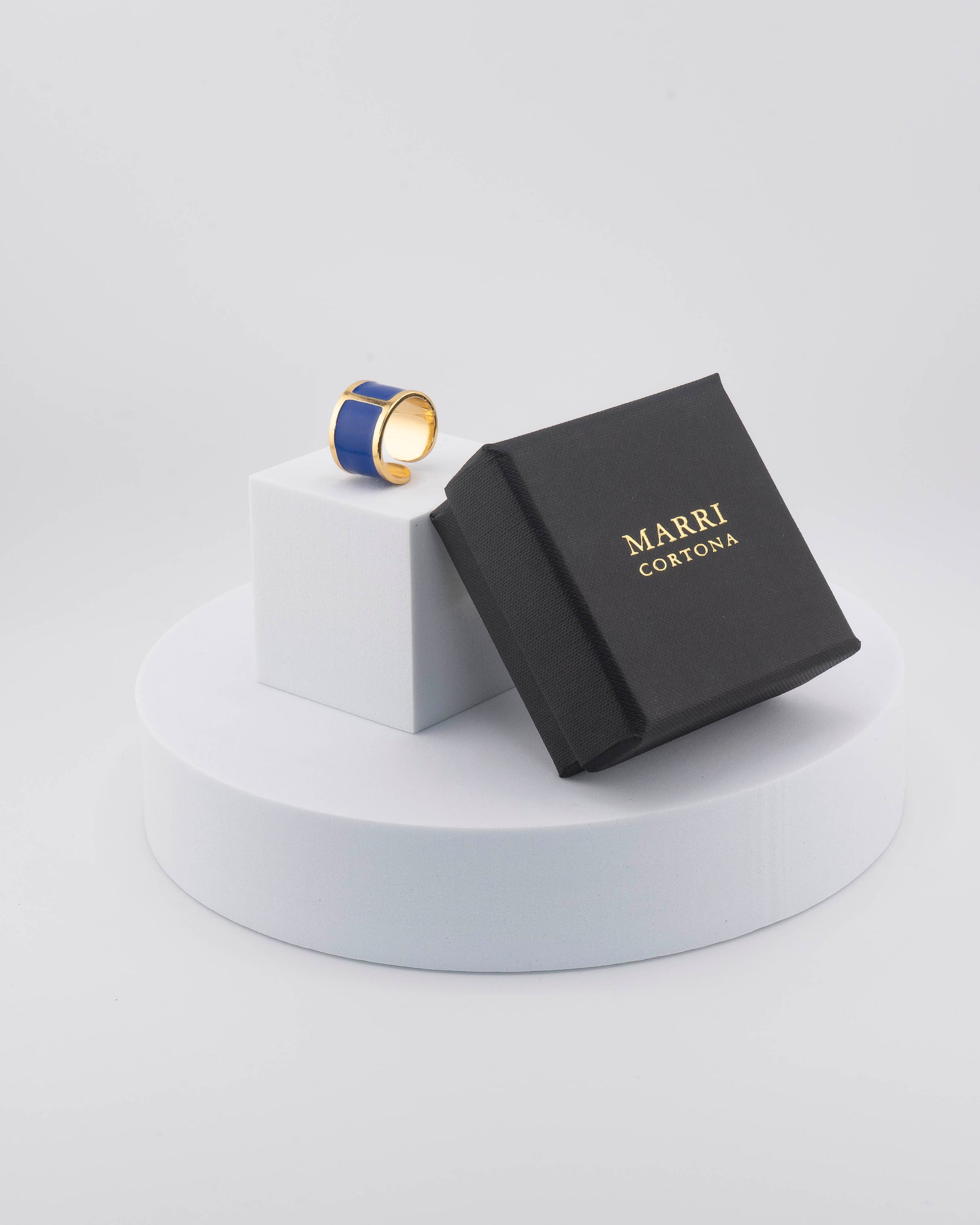 Handcrafted in Tuscany, the MarriCortona Smalto Rings combine 18k gold and hand-painted enamel — vibrant, refined, and authentically Made in Italy.