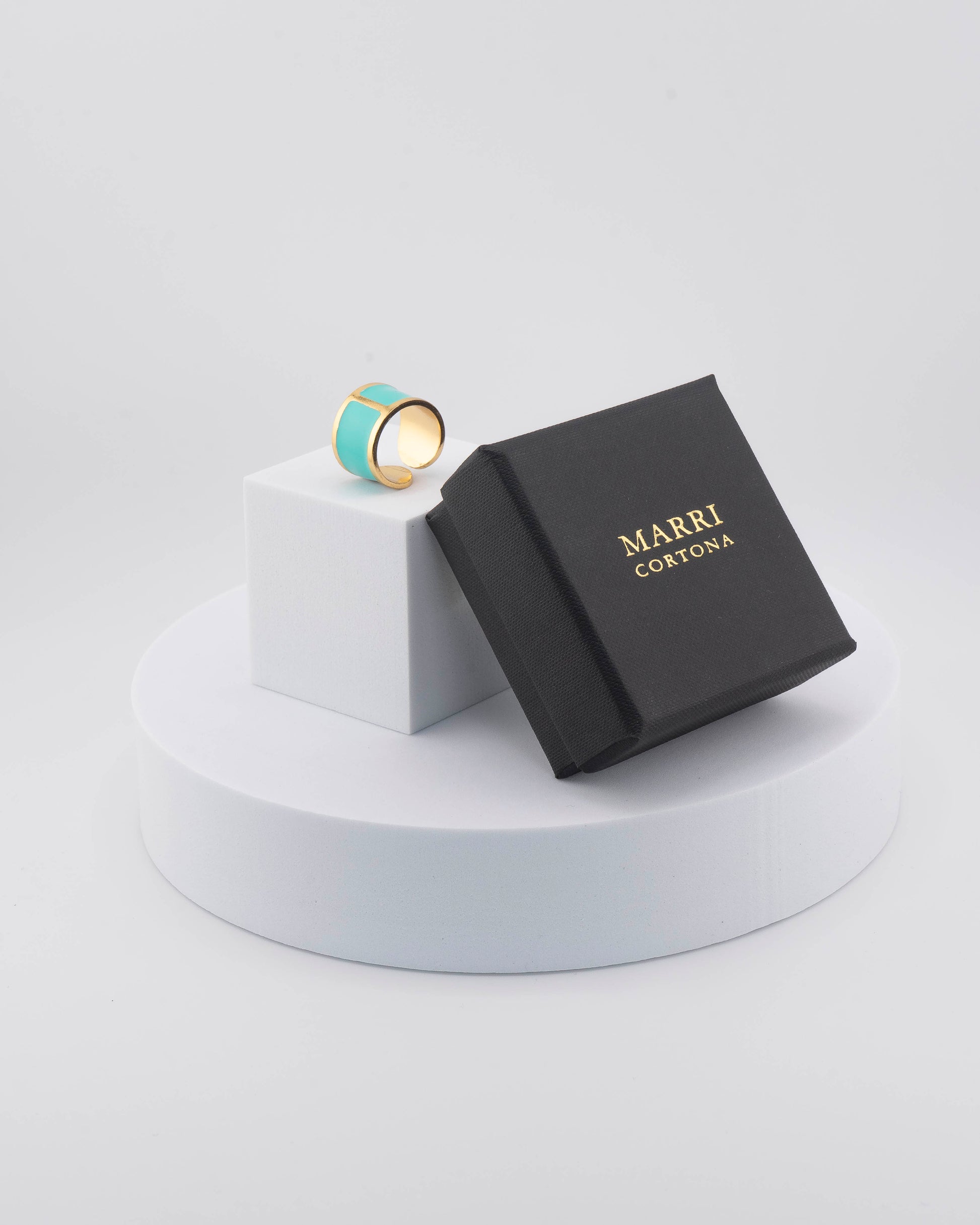 Handcrafted in Tuscany, the MarriCortona Smalto Rings combine 18k gold and hand-painted enamel — vibrant, refined, and authentically Made in Italy.