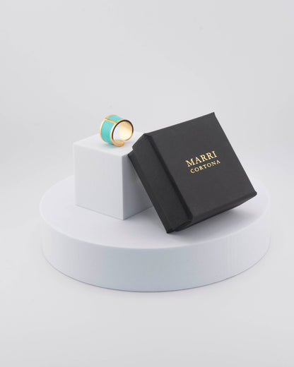 Handcrafted in Tuscany, the MarriCortona Smalto Rings combine 18k gold and hand-painted enamel — vibrant, refined, and authentically Made in Italy.