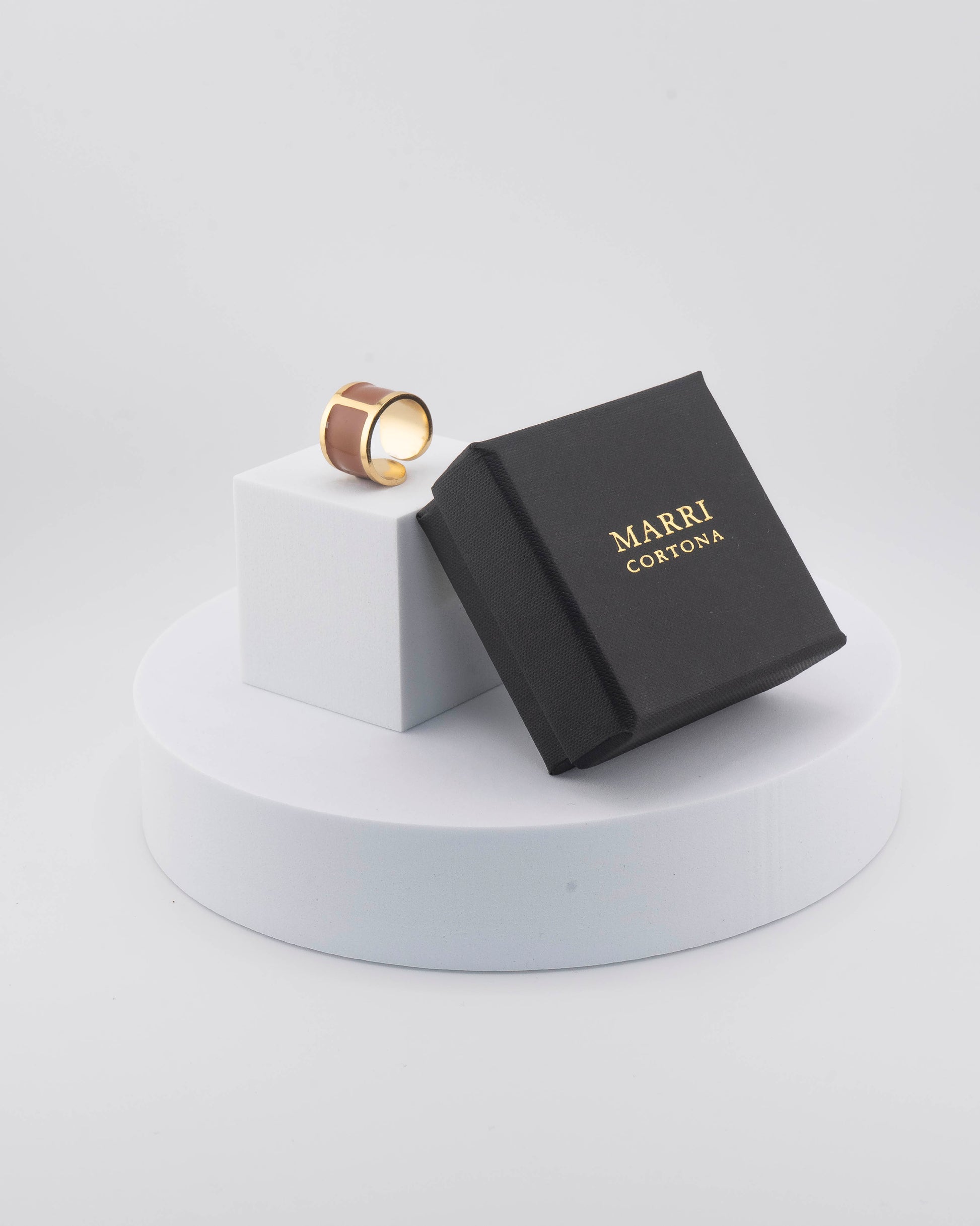 Handcrafted in Tuscany, the MarriCortona Smalto Rings combine 18k gold and hand-painted enamel — vibrant, refined, and authentically Made in Italy.