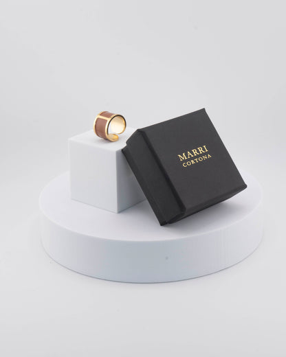 Handcrafted in Tuscany, the MarriCortona Smalto Rings combine 18k gold and hand-painted enamel — vibrant, refined, and authentically Made in Italy.