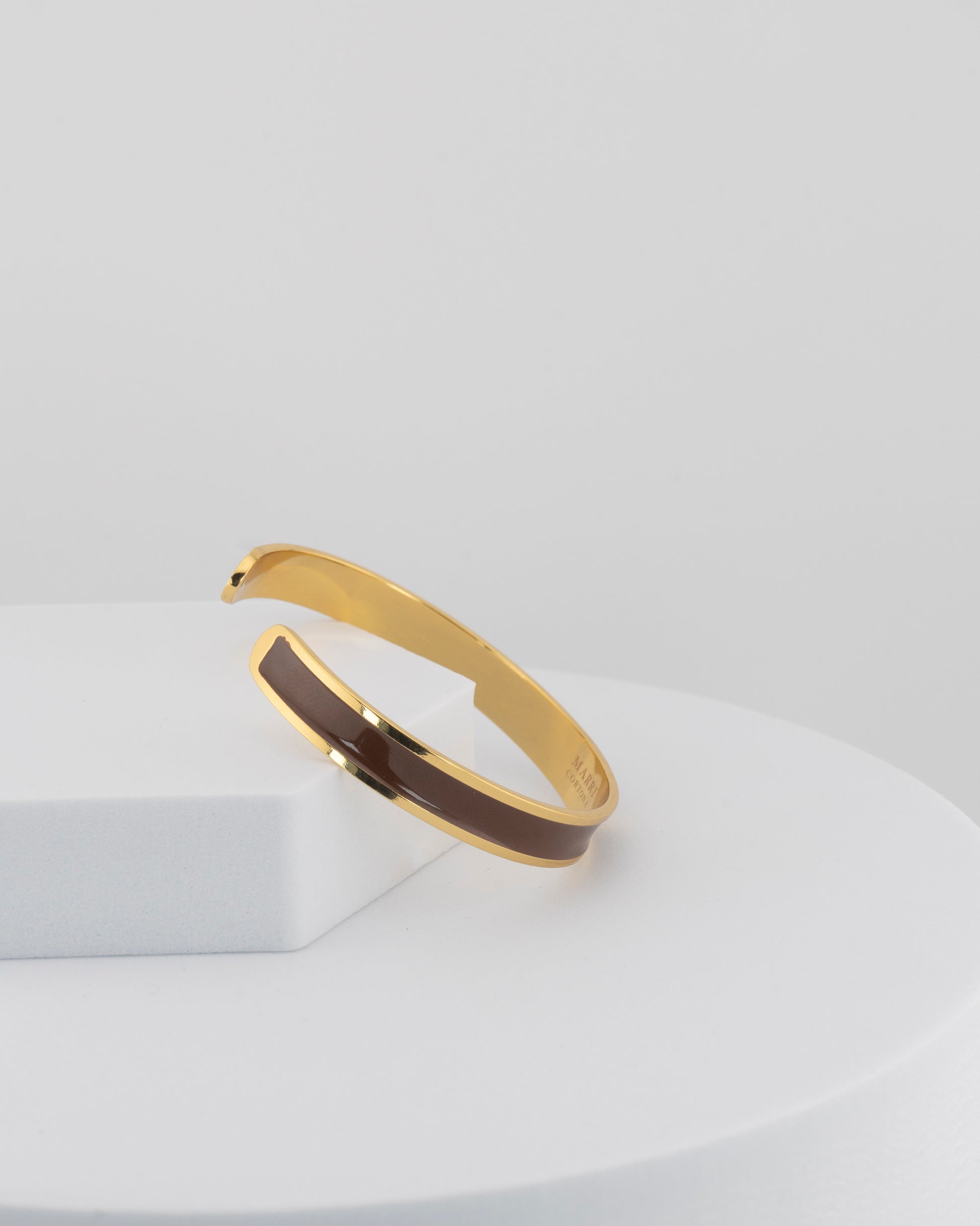 Handcrafted in Tuscany, the MarriCortona Smalto Bracelets in 18k gold and hand-painted enamel embody Italian artistry, color, and timeless elegance.