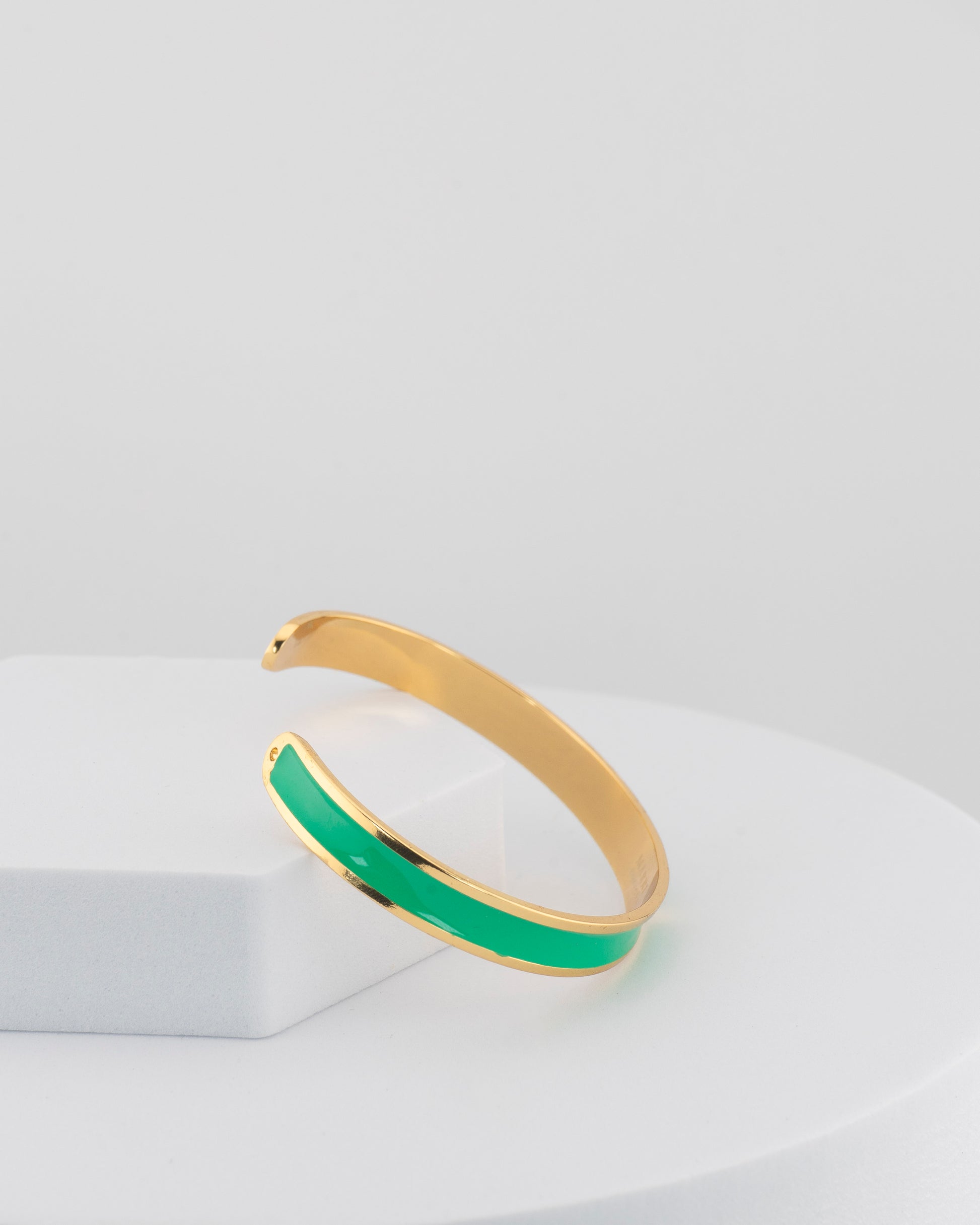 Handcrafted in Tuscany, the MarriCortona Smalto Bracelets in 18k gold and hand-painted enamel embody Italian artistry, color, and timeless elegance.