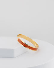 Handcrafted in Tuscany, the MarriCortona Smalto Bracelets in 18k gold and hand-painted enamel embody Italian artistry, color, and timeless elegance.
