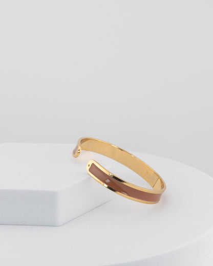 Handcrafted in Tuscany, the MarriCortona Smalto Bracelets in 18k gold and hand-painted enamel embody Italian artistry, color, and timeless elegance.