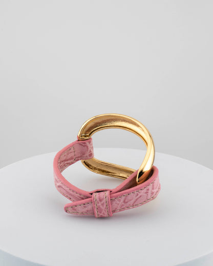 Handcrafted 18K gold-plated bronze bracelet with genuine crocodile leather strap.
An original Marri Cortona design — handmade in Tuscany.