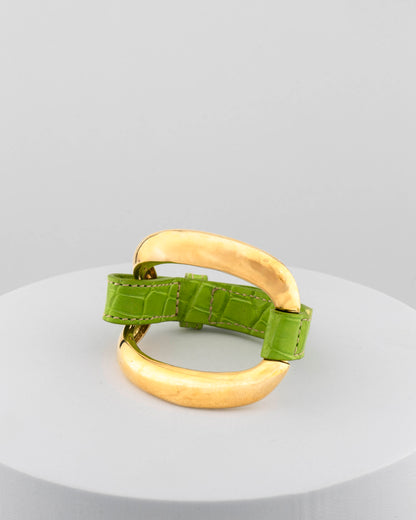 Handcrafted 18K gold-plated bronze bracelet with genuine crocodile leather strap.
An original Marri Cortona design — handmade in Tuscany.
