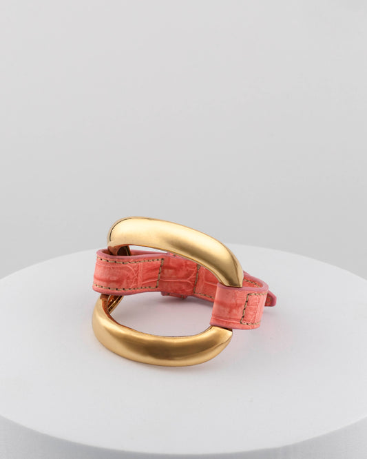 Handcrafted 18K gold-plated bronze bracelet with genuine crocodile leather strap.
An original Marri Cortona design — handmade in Tuscany.