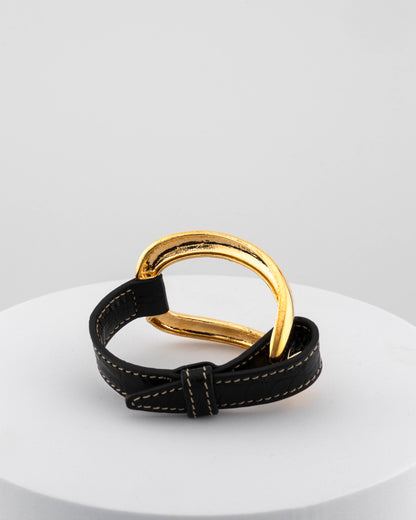 Handcrafted 18K gold-plated bronze bracelet with genuine crocodile leather strap.
An original Marri Cortona design — handmade in Tuscany.