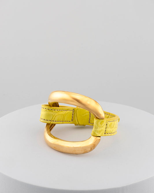 Handcrafted 18K gold-plated bronze bracelet with genuine crocodile leather strap.
An original Marri Cortona design — handmade in Tuscany.