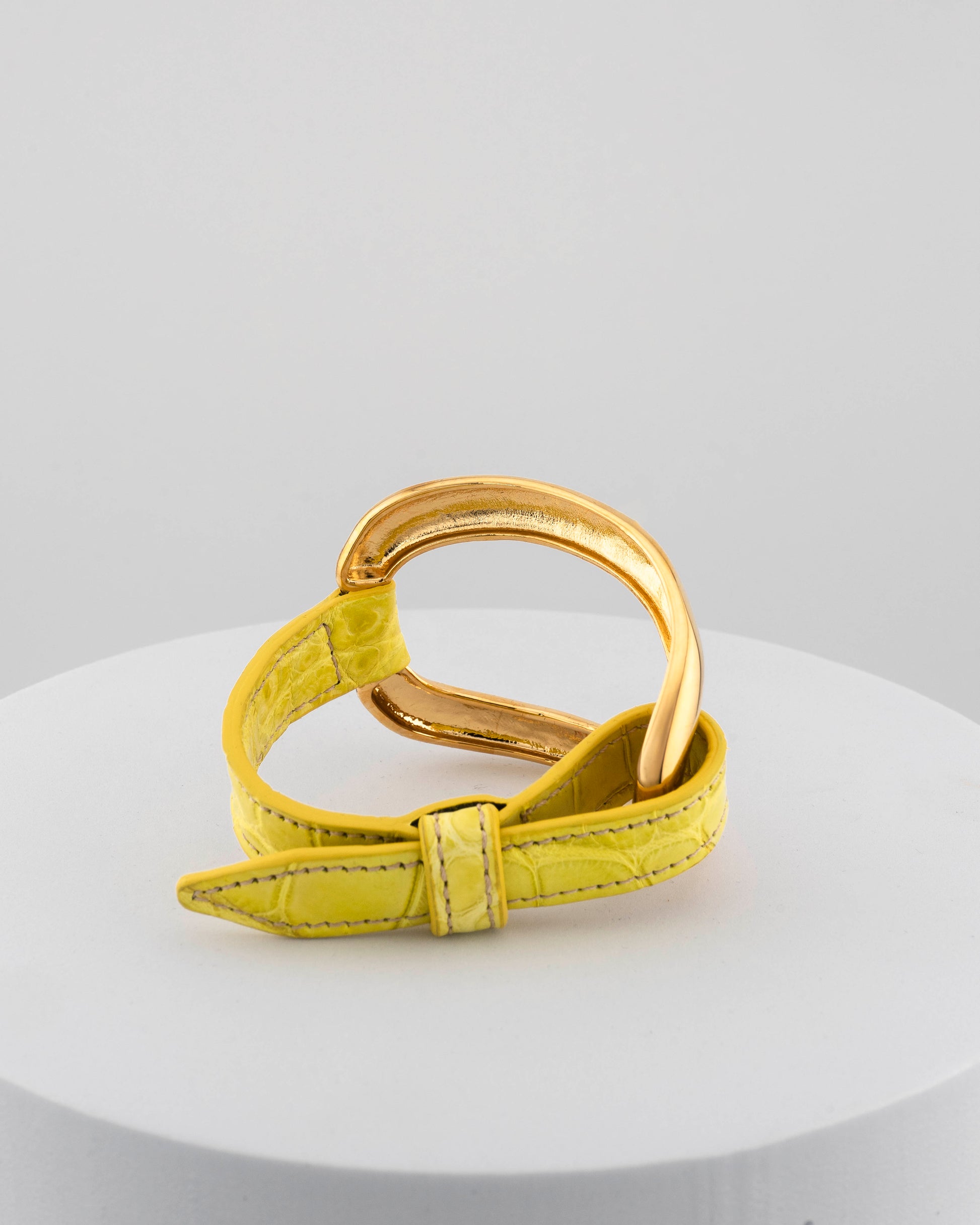 Handcrafted 18K gold-plated bronze bracelet with genuine crocodile leather strap.
An original Marri Cortona design — handmade in Tuscany.
