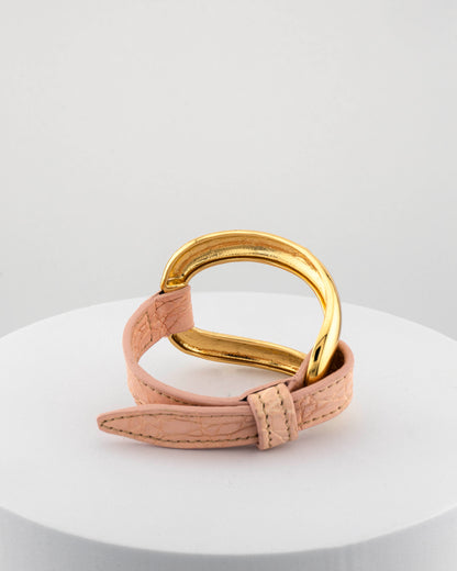 Handcrafted 18K gold-plated bronze bracelet with genuine crocodile leather strap.
An original Marri Cortona design — handmade in Tuscany.