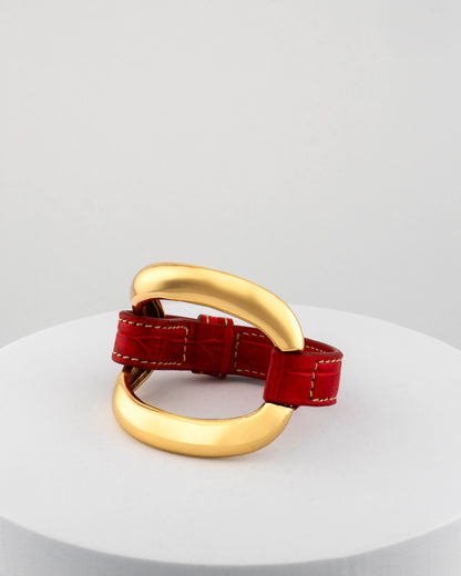 Handcrafted 18K gold-plated bronze bracelet with genuine crocodile leather strap.
An original Marri Cortona design — handmade in Tuscany.
