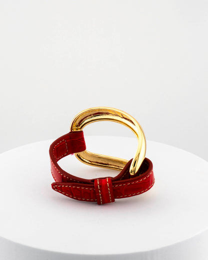 Handcrafted 18K gold-plated bronze bracelet with genuine crocodile leather strap.
An original Marri Cortona design — handmade in Tuscany.