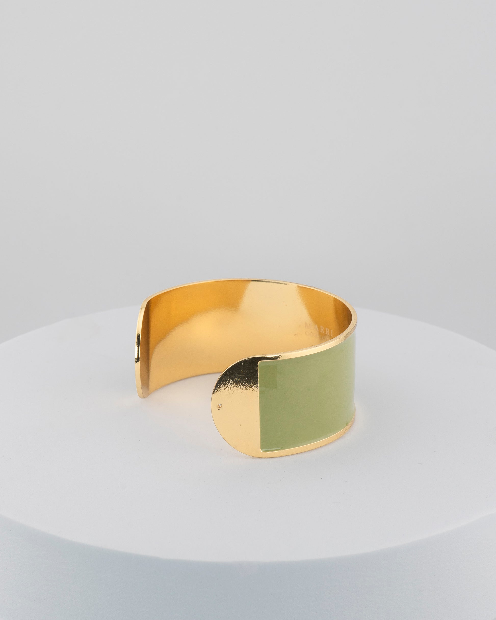 Handcrafted in Tuscany, the MarriCortona Smalto Bracelets in 18k gold and hand-painted enamel feature bold 30 mm bands — radiant, elegant, and uniquely Italian.