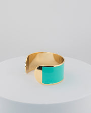 Handcrafted in Tuscany, the MarriCortona Smalto Bracelets in 18k gold and hand-painted enamel feature bold 30 mm bands — radiant, elegant, and uniquely Italian.