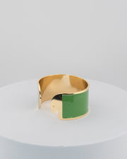 Handcrafted in Tuscany, the MarriCortona Smalto Bracelets in 18k gold and hand-painted enamel feature bold 30 mm bands — radiant, elegant, and uniquely Italian.