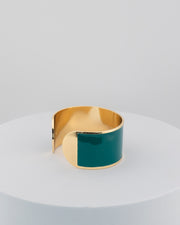 Handcrafted in Tuscany, the MarriCortona Smalto Bracelets in 18k gold and hand-painted enamel feature bold 30 mm bands — radiant, elegant, and uniquely Italian.
