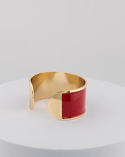 Handcrafted in Tuscany, the MarriCortona Smalto Bracelets in 18k gold and hand-painted enamel feature bold 30 mm bands — radiant, elegant, and uniquely Italian.