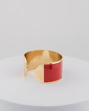 Handcrafted in Tuscany, the MarriCortona Smalto Bracelets in 18k gold and hand-painted enamel feature bold 30 mm bands — radiant, elegant, and uniquely Italian.