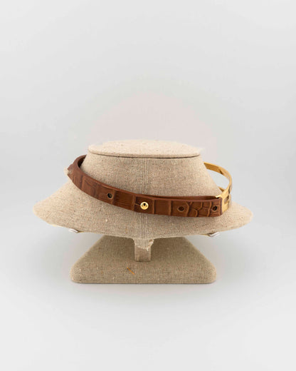 Refined 18K gold-plated bronze choker with genuine crocodile leather.
An exclusive Marri Cortona design — handmade in Tuscany.